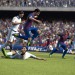 FIFA13_Messi_avoids_tackle_LOC